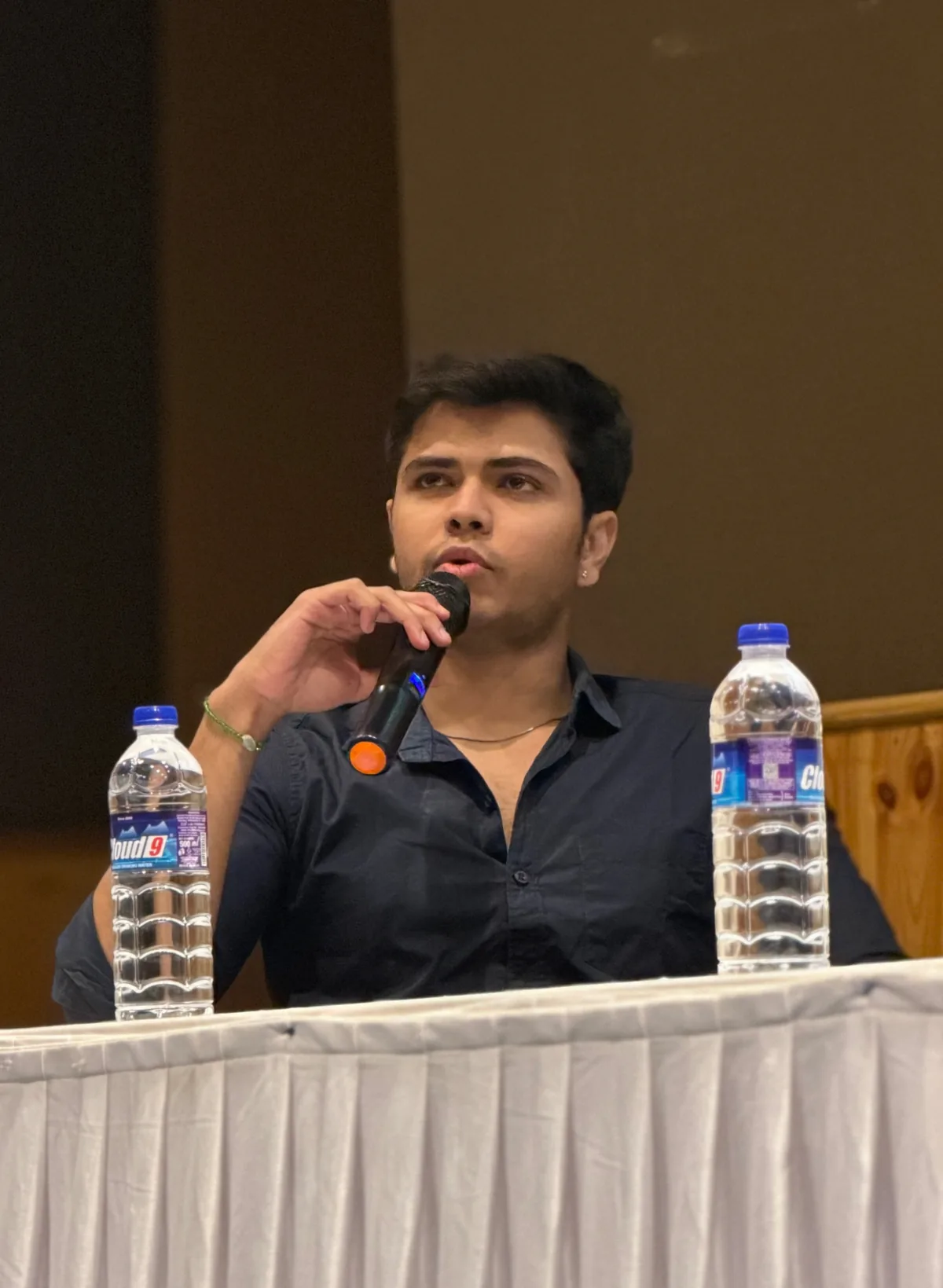 Hem Meisheri speaking on a panel in Mumbai